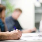 Photograph showing a website design process meeting